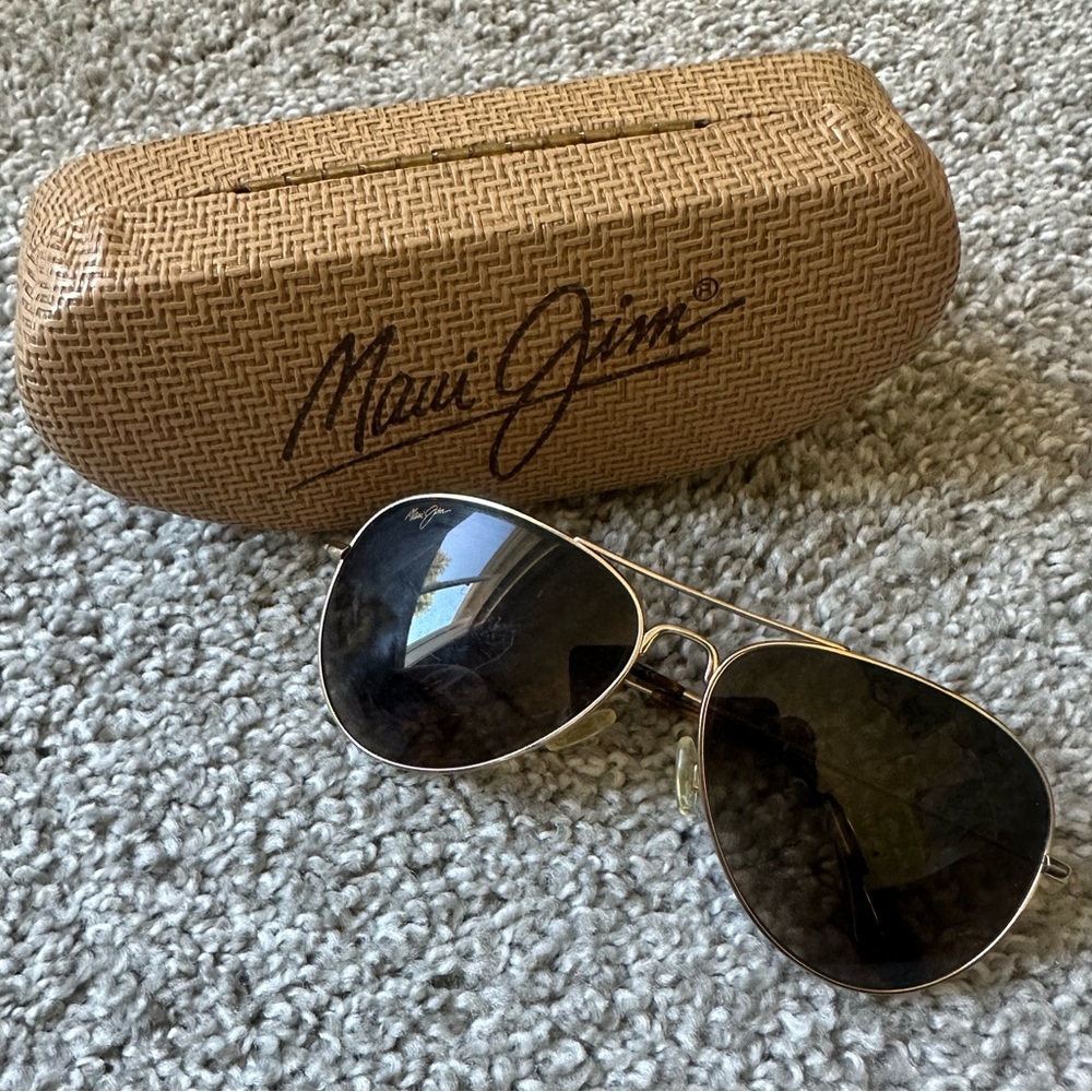 Maui Jim Aviator Sunglasses with Gold Frame and Dark Lenses